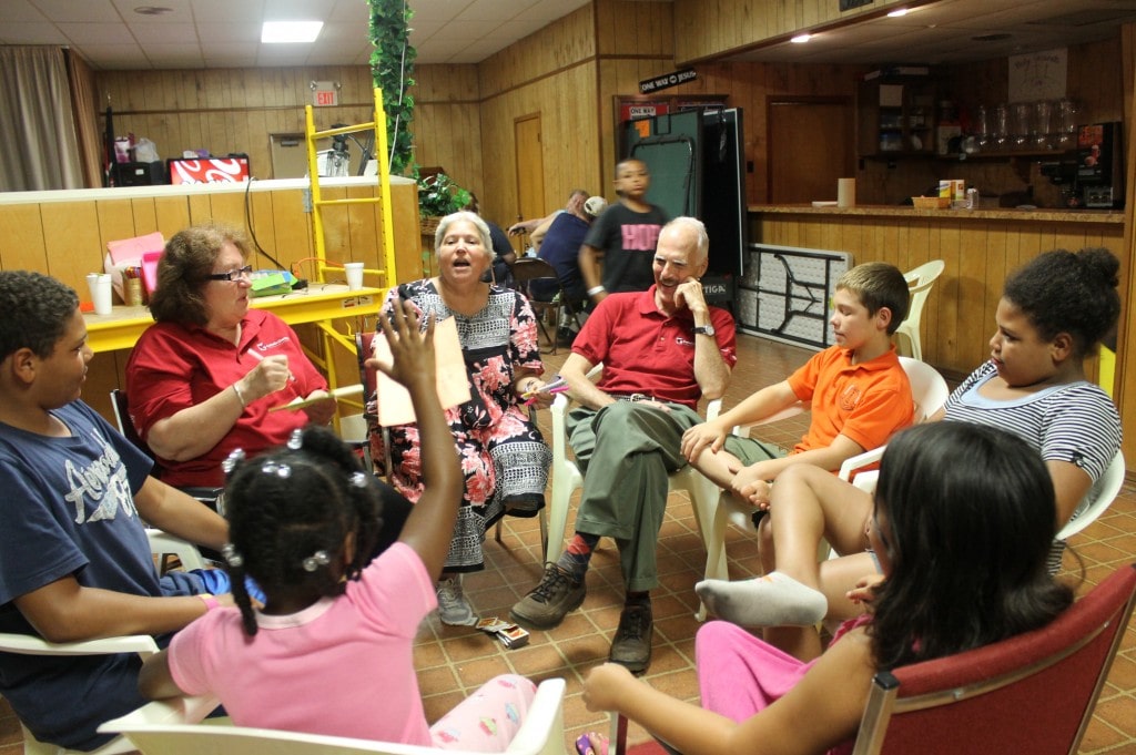 CCANO Counselors engage kids in a group activity at the Belle Chase Lions Club Emergency Shelter